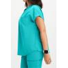 Fabletics Women’s Evolve 3-Pocket Scrub Top with an Oversized Fit – MotionTech, 4-Way Stretch, Wrinkle-Resist, Anti-Shrink(Electric Teal)