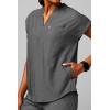 Fabletics Women’s Evolve 3-Pocket Scrub Top with an Oversized Fit – MotionTech, 4-Way Stretch, Wrinkle-Resist, Anti-Shrink(Heather Grey)