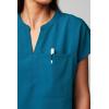 Fabletics Women’s Evolve 3-Pocket Scrub Top with an Oversized Fit – MotionTech, 4-Way Stretch, Wrinkle-Resist, Anti-Shrink(Caribbean Blue)
